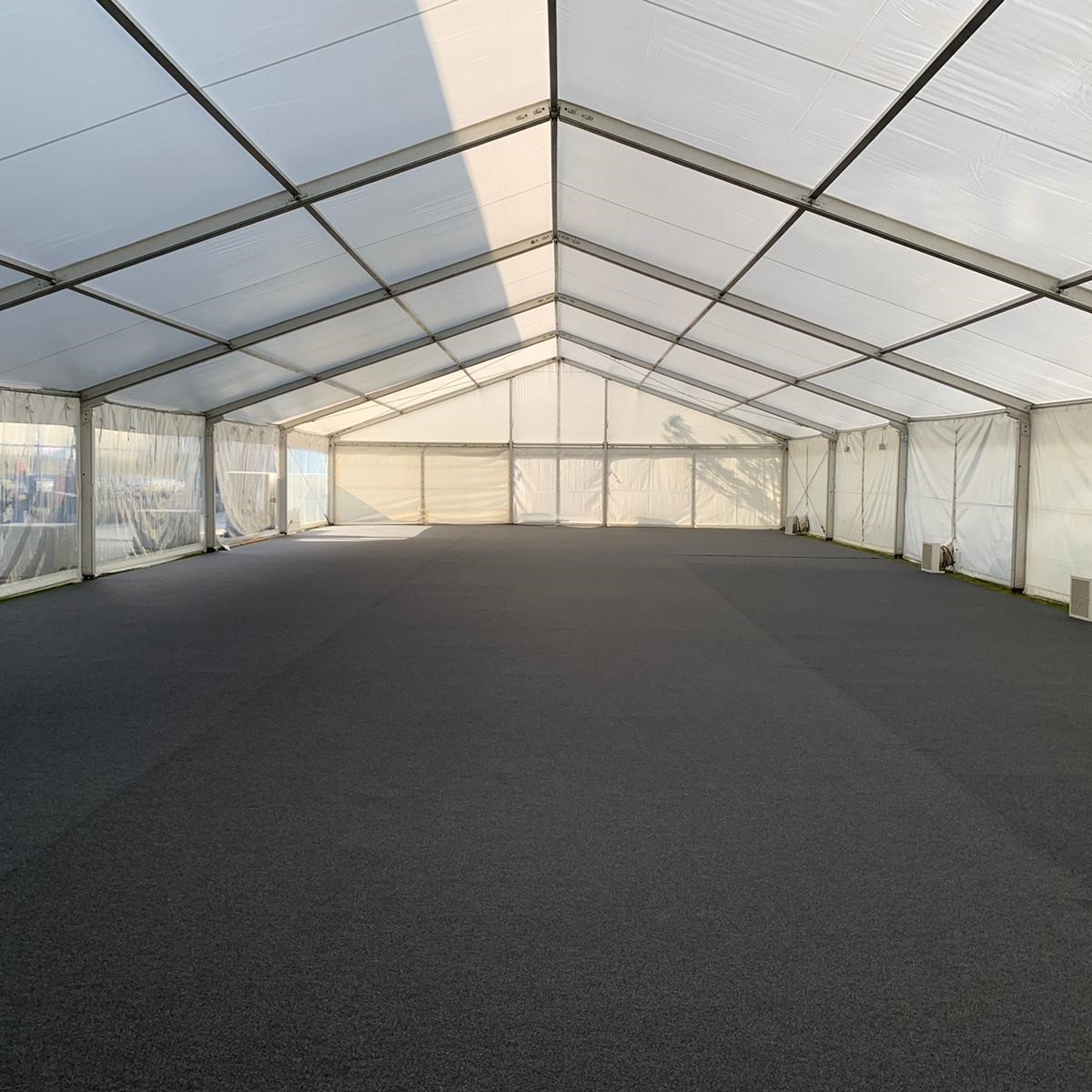 Film set crew catering marquee with carpet and heating