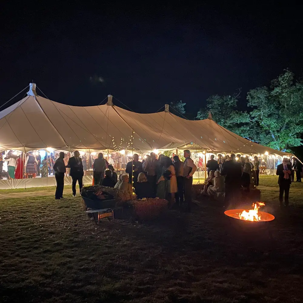 Petal Pole at night. Marquee hire Bedfordshire