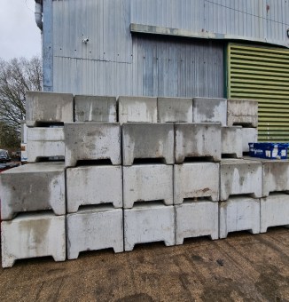 Concrete blocks stacked outside Fairytale Marquees yard ready for delivery. The blocks are used to weight down marquees when they cannot be staked