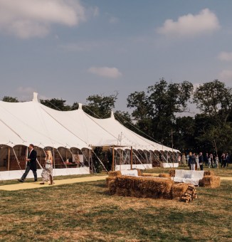 40ft wide vintage looking sail cloth marquee with festoons and bunting